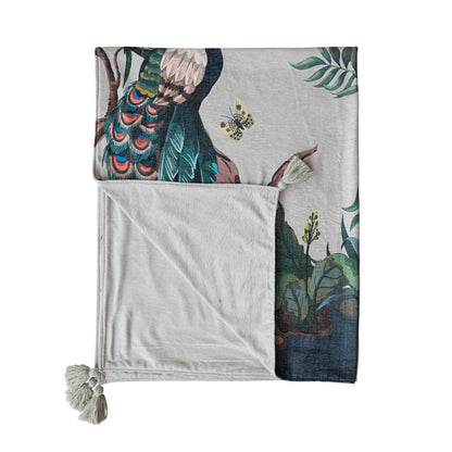 folded throw blanket with corner tassels