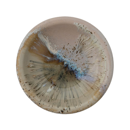 top view of bowl with brown, beige, and blue reactive glaze