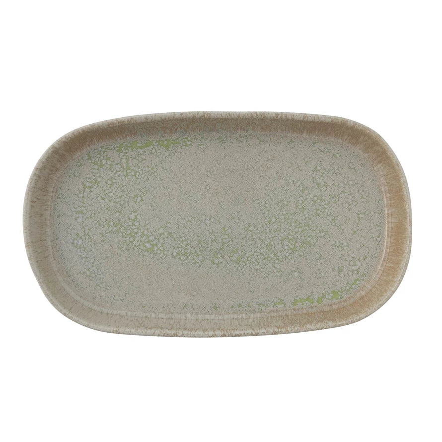 Rectangular ceramic platter with reactive glaze design on a white background
