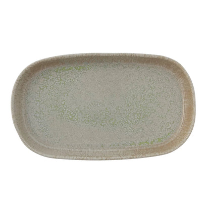 Rectangular ceramic platter with reactive glaze design on a white background