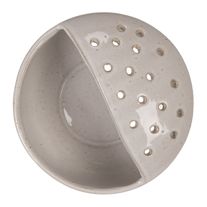 stoneware bowl strainer on a white background