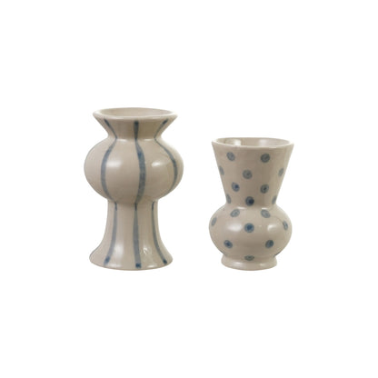 2 small bud vases with blue dots or stripes on them shown on a white background