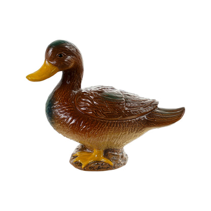 Duck figurine shown on a white background