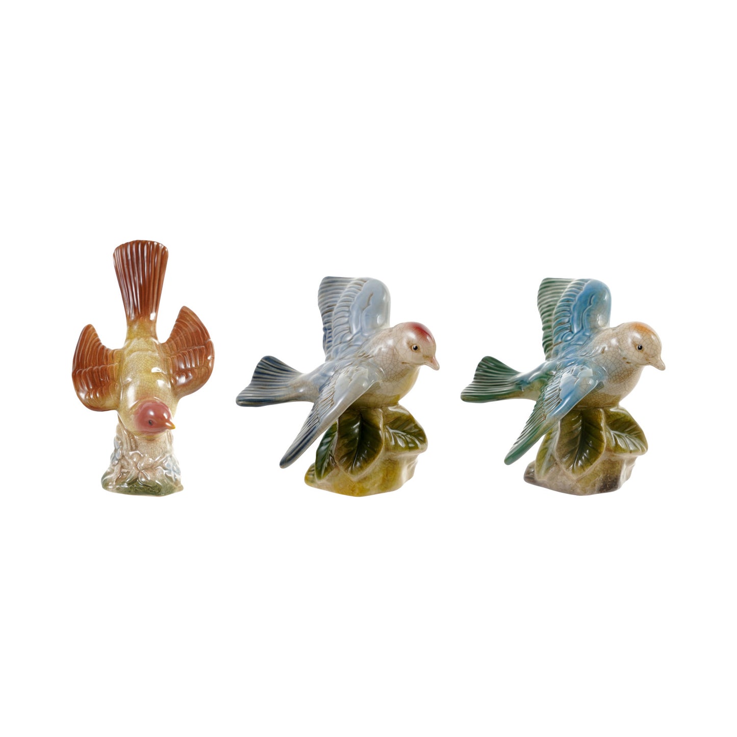 decorative ceramic bird figures  in a row on a white background