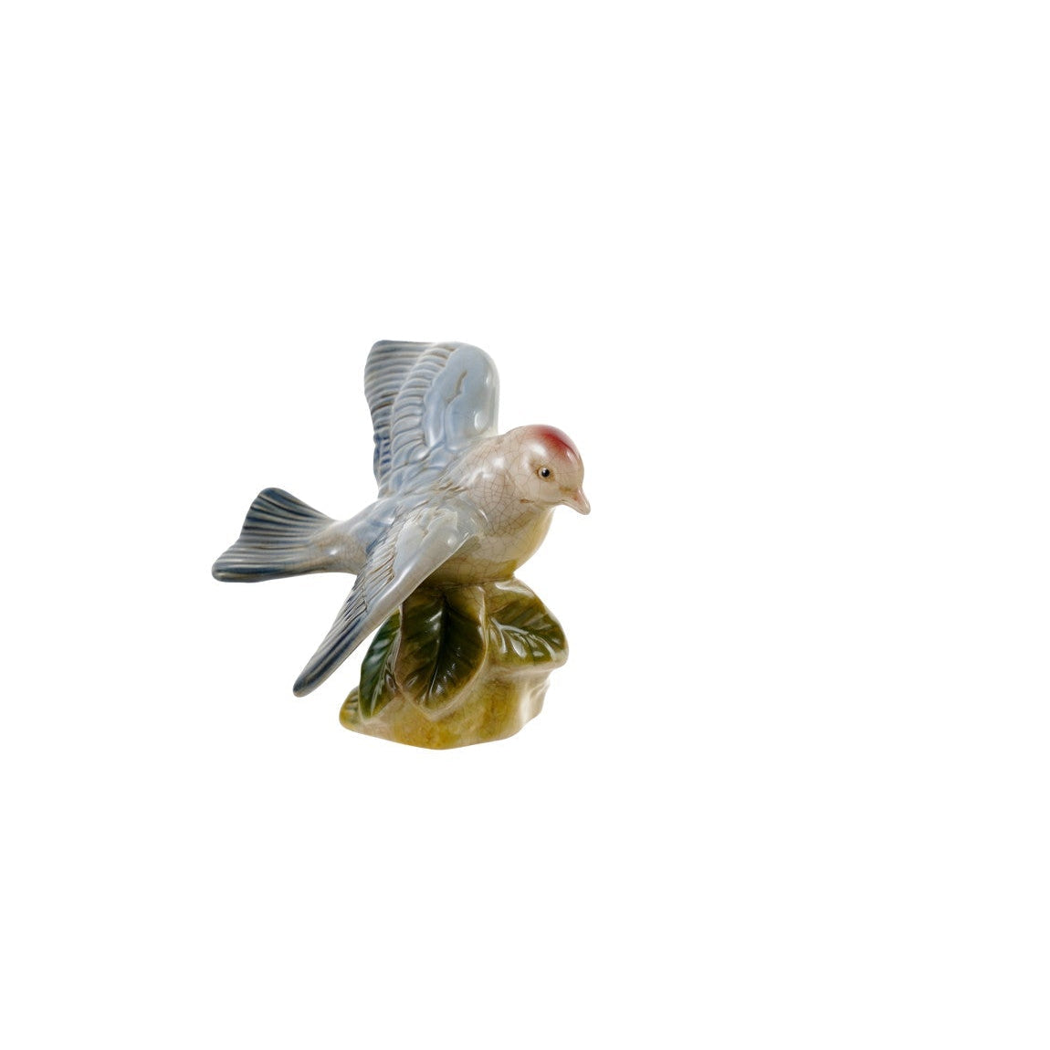 decorative ceramic blue bird perched on green leaves figurine