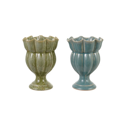 a green and a blue ruffled vase shown on a white background