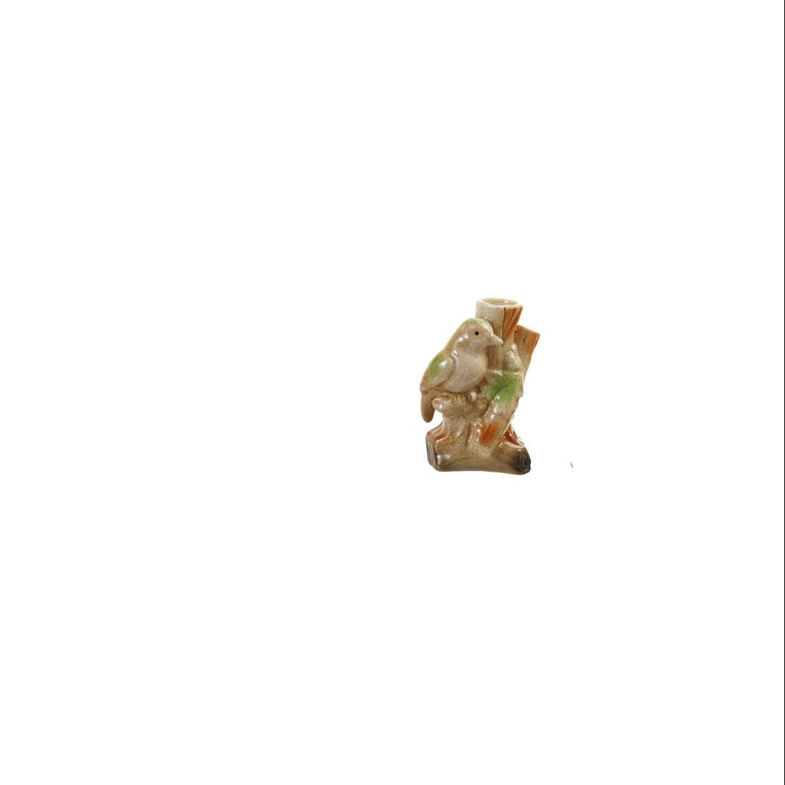 ceramic vase shaped like green bird sitting on a tree branch