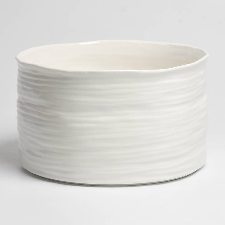 organic shaped white serving bowl with high, straight sides