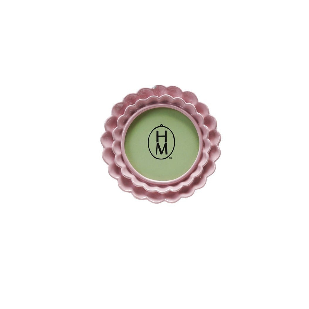 round dark pink frame with a double ruffle design shown on a white background