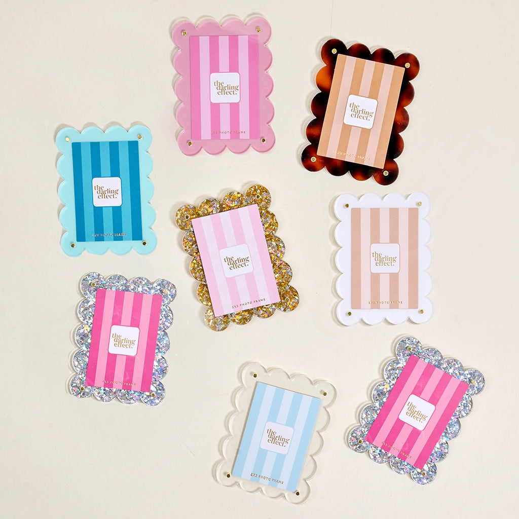 assorted Mini Acrylic Frame Magnets arranged on a beige background