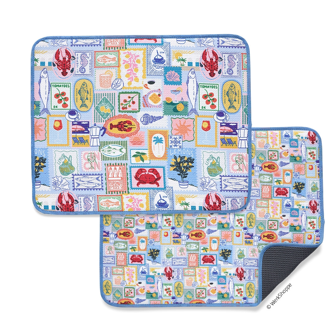 2 mediterranean summer dish mats on a white background