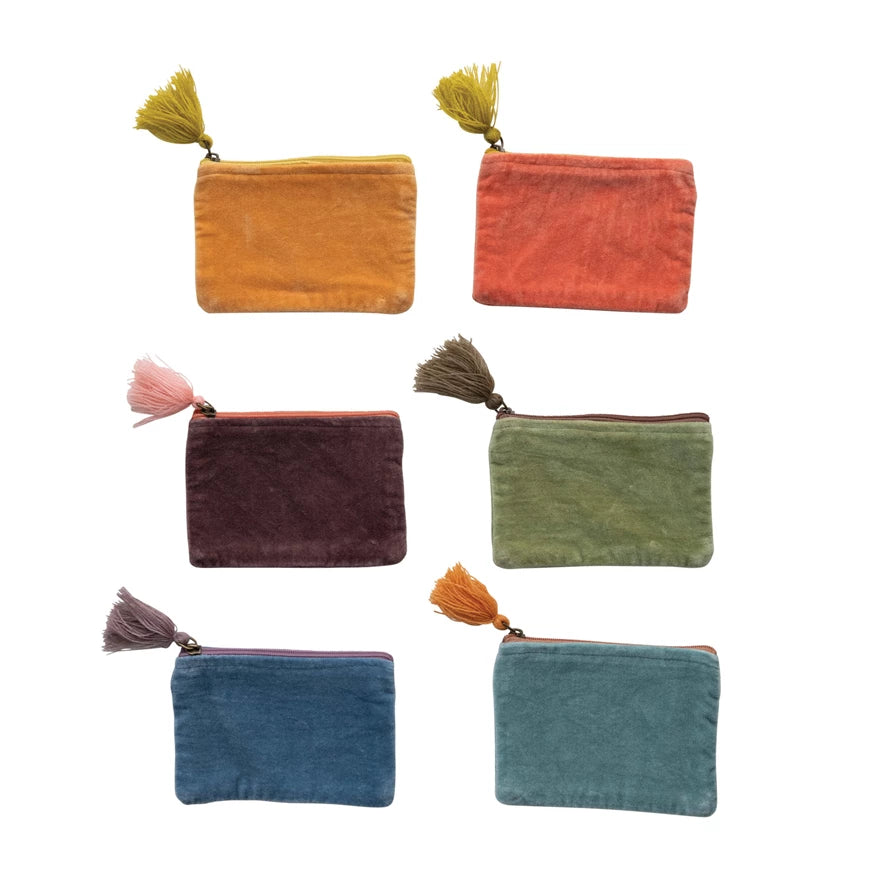 all six colors of velvet zip pouch with tassels displayed against a white background
