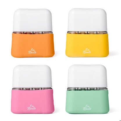 Bon Voyage Travel Bottle Set in 4 colors: orange, yellow, pink, teal arranged on a white background