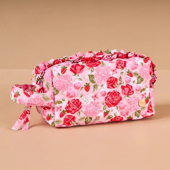 Floral patterned bag on a beige background