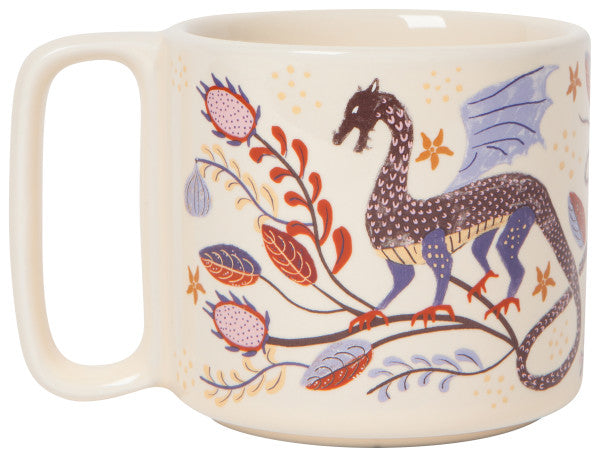other side of mug with dragon and floral design in shades of purple and orange.