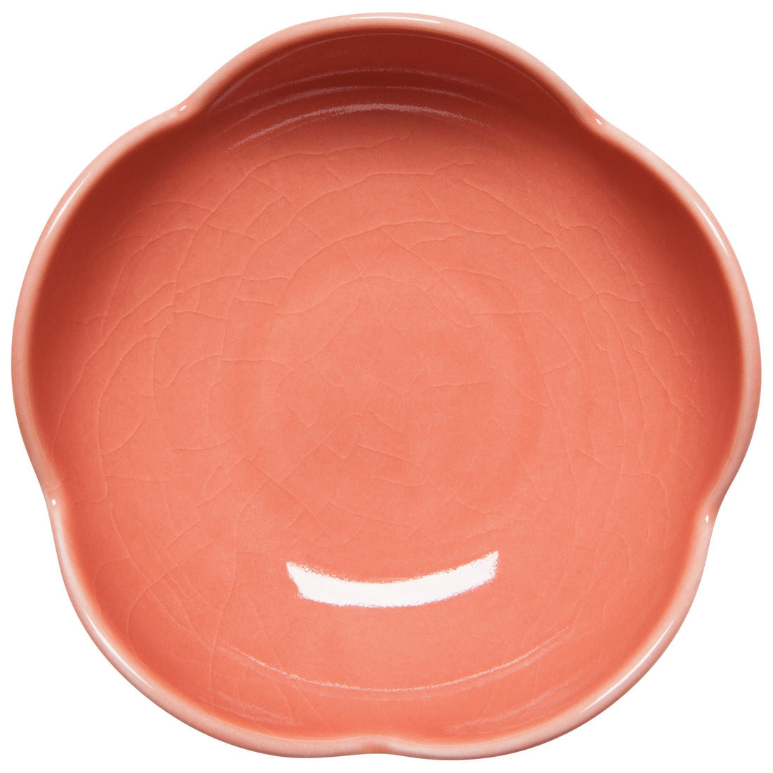 little ceramic dish that is pink and shaped like a flower