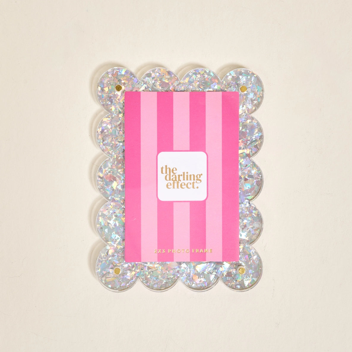 Scalloped silver confetti magnetic frame on a white background.