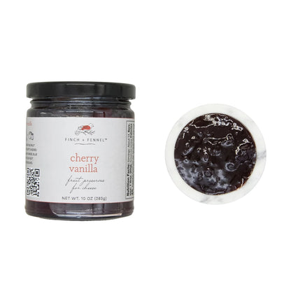 jar of Cherry Vanilla Fruit Preserves with a dish of it set next to the jar