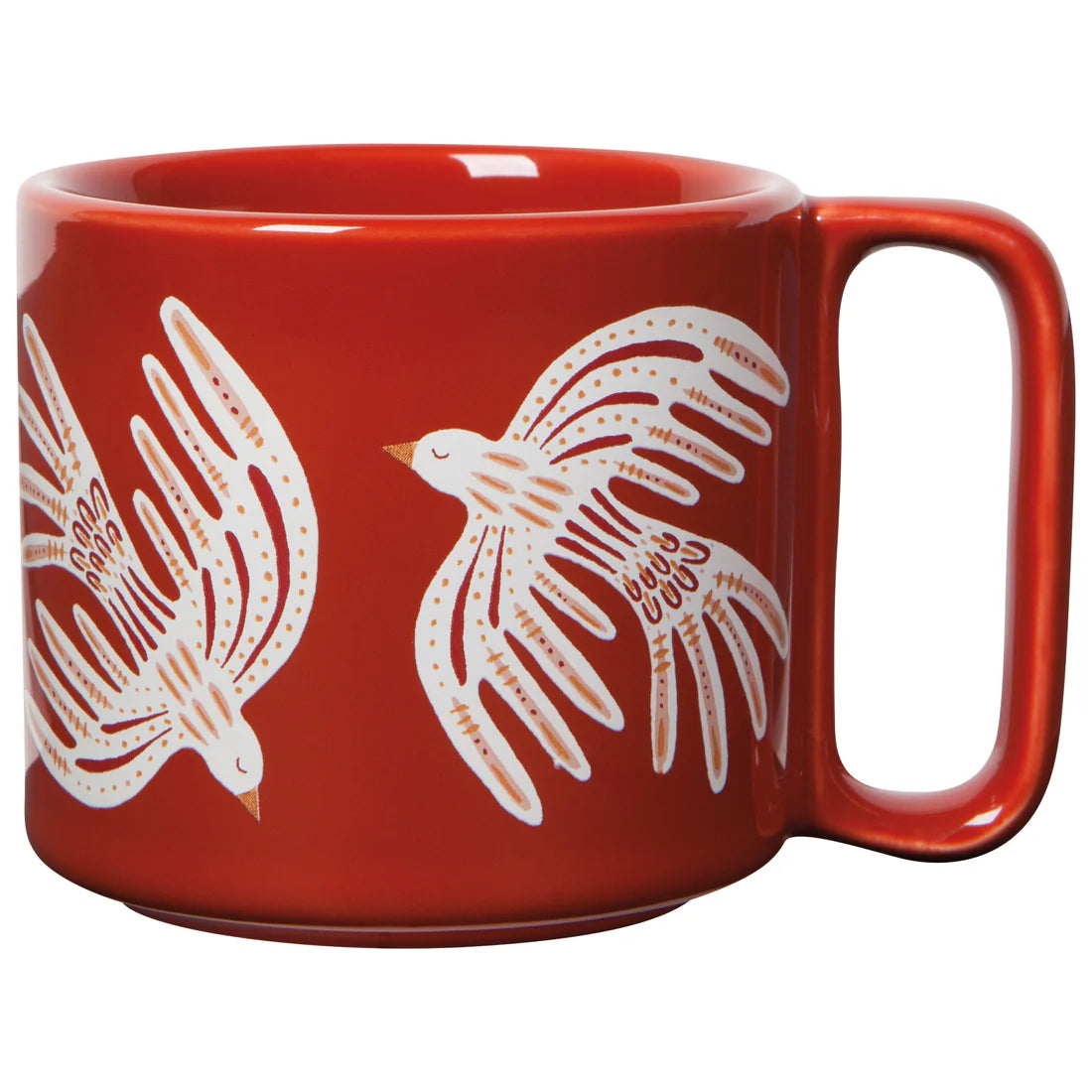 rust colored mug with white birds printed on it.