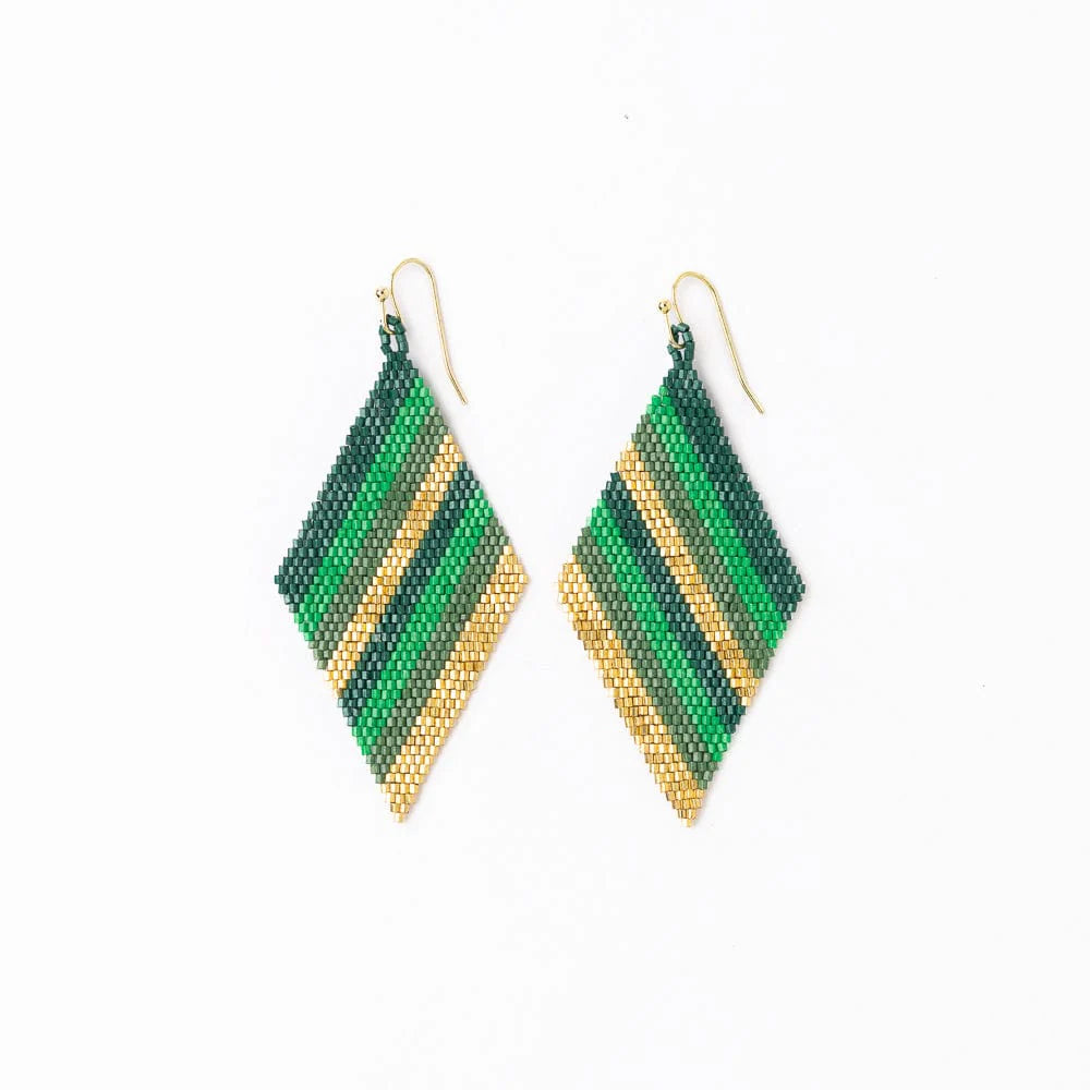 Green and gold beaded earrings on a white background