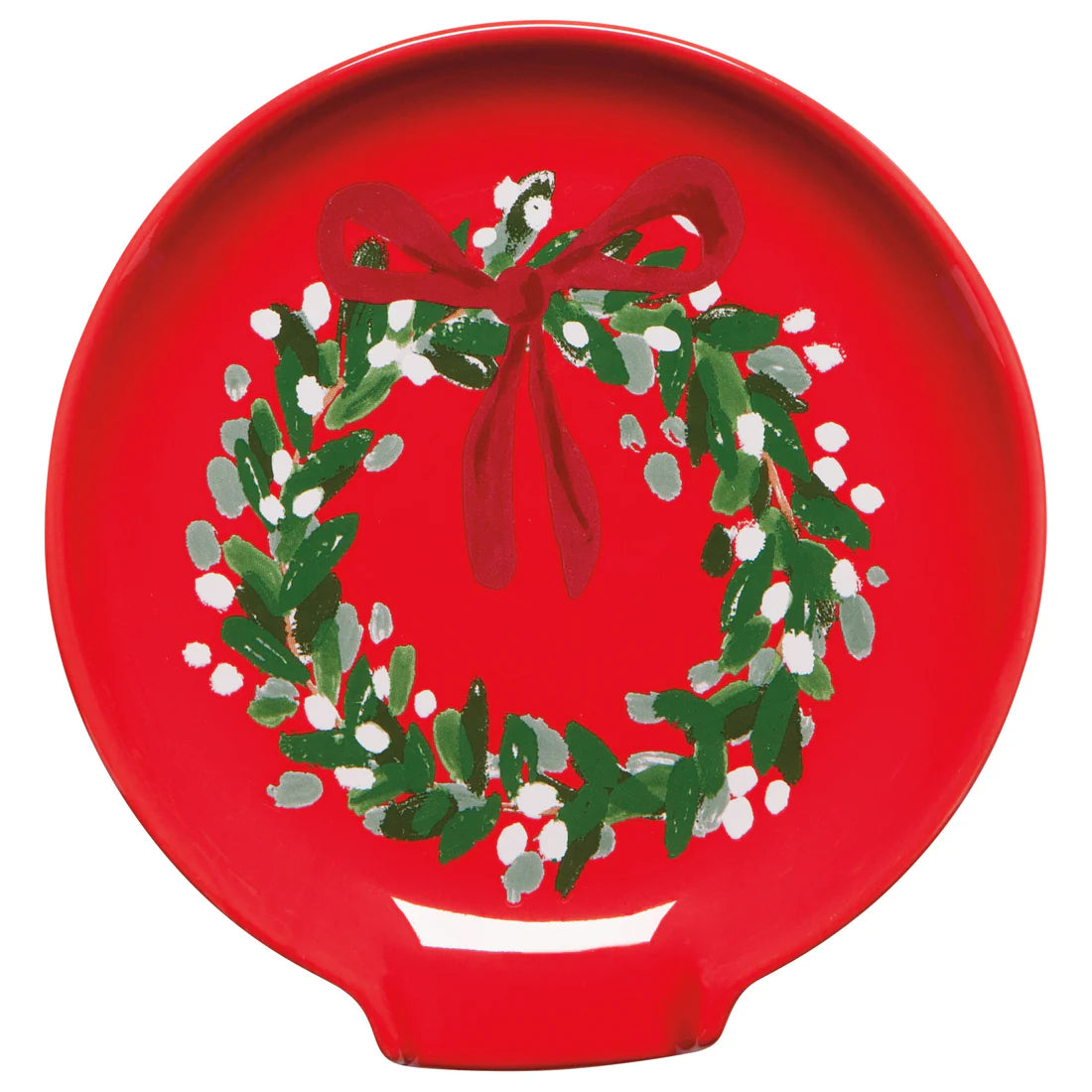 red spoon rest with wreath printed on it.