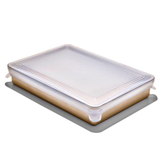 rectangle Good Grips Silicone Bakeware Lid displayed on a rectangle bakeware on a white background