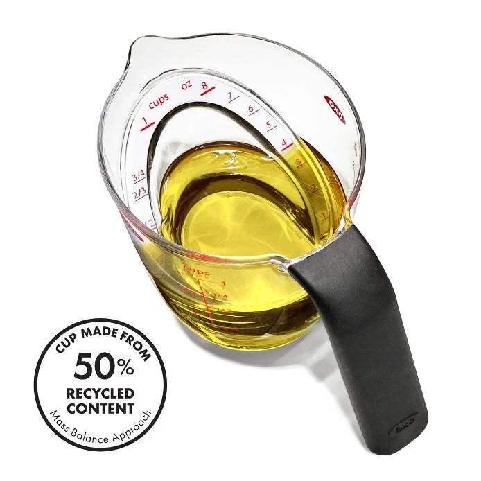 top view of Good Grips Angled Measuring Cup with oil in it