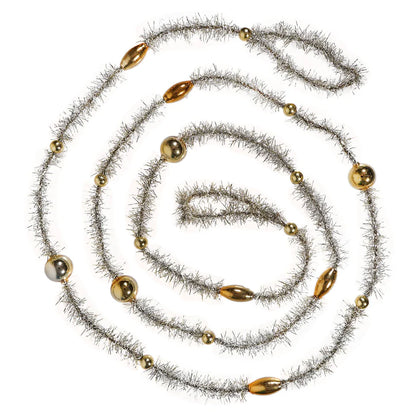 Decorative garland with gold beads and silver tinsel swirled on a white background