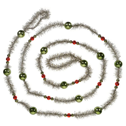 Decorative garland with green beads and silver tinsel swirled on a white background