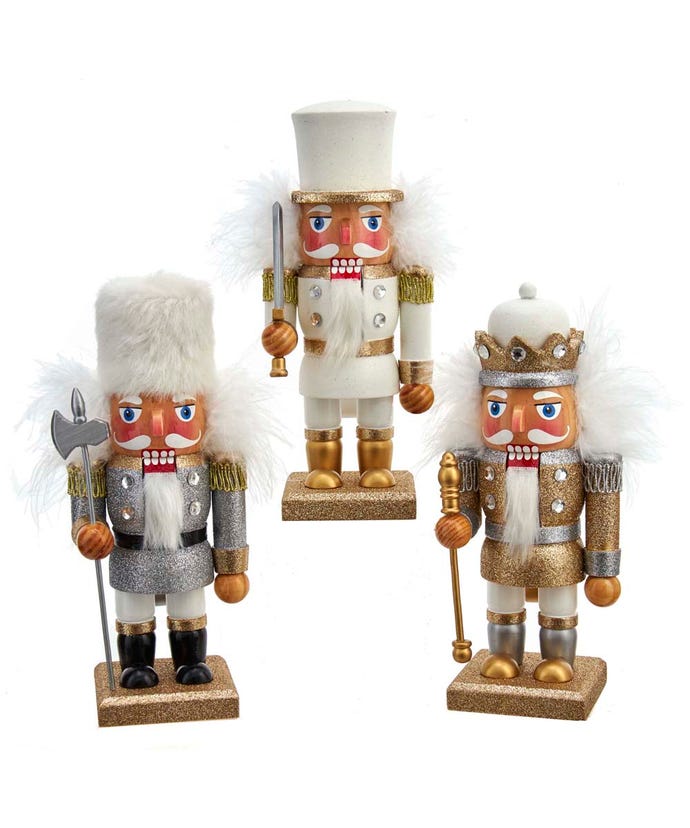 all three styles of gold and silver soldier nutcrackers displayed against a white background