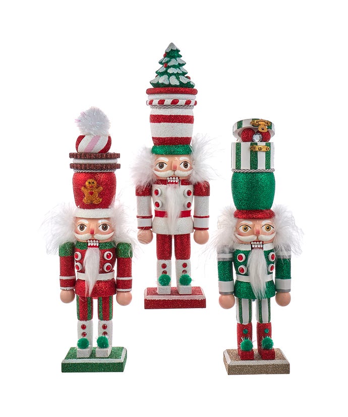 all three styles of whimsical hat nutcrackers displayed against a white background