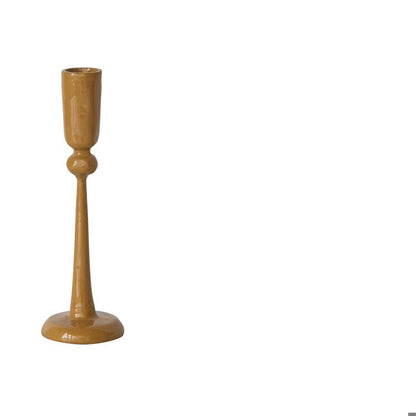 mustard yellow taper holder shown on a white background