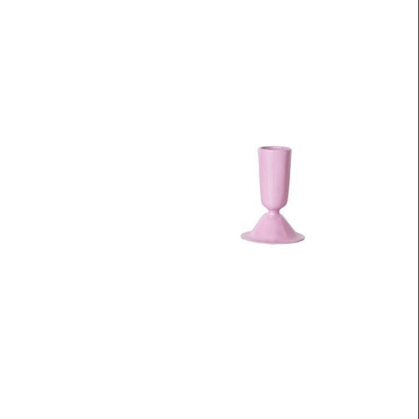 small lavender taper candle holder on a white background