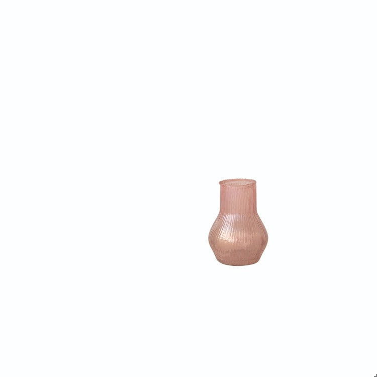 small pink glass vase on white background