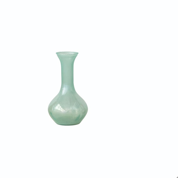 pastel blue glass vase with narrow neck on white background