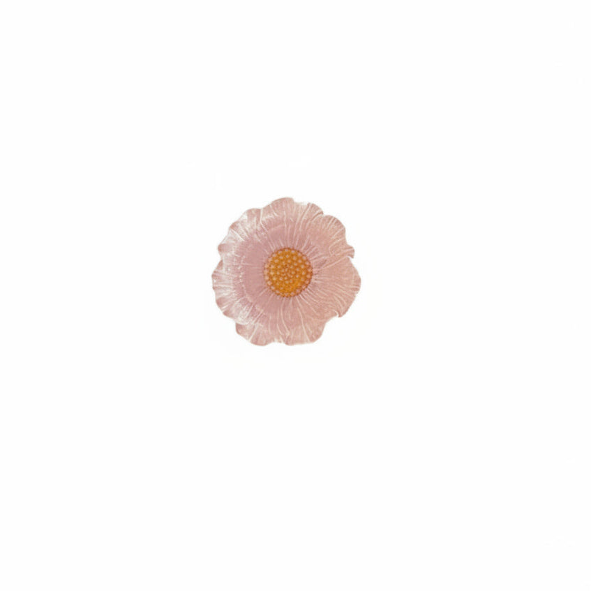 pink flower shaped bowl with orange center