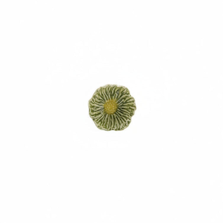 green flower shaped bowl with yellow  center