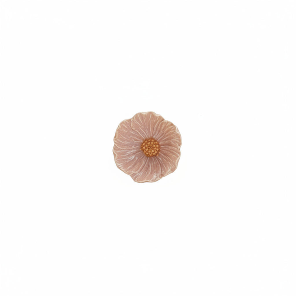pink flower shaped bowl with bright orange center