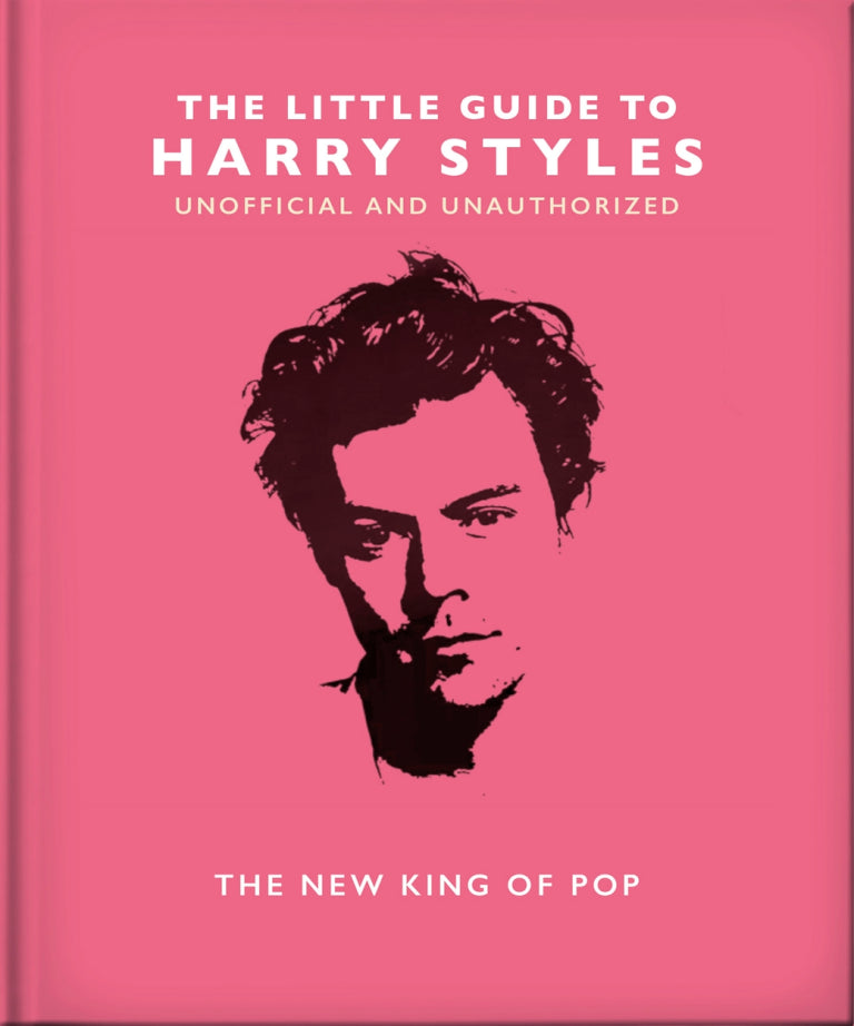 pink front cover of harry styles book with image of harry printed on it.