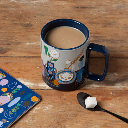 Still Life Studio Mug filled with beverage and set on a wooden table