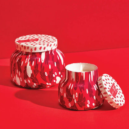 Two sizes of apple cider social candles in pattern play jars. The smaller candle is lit.