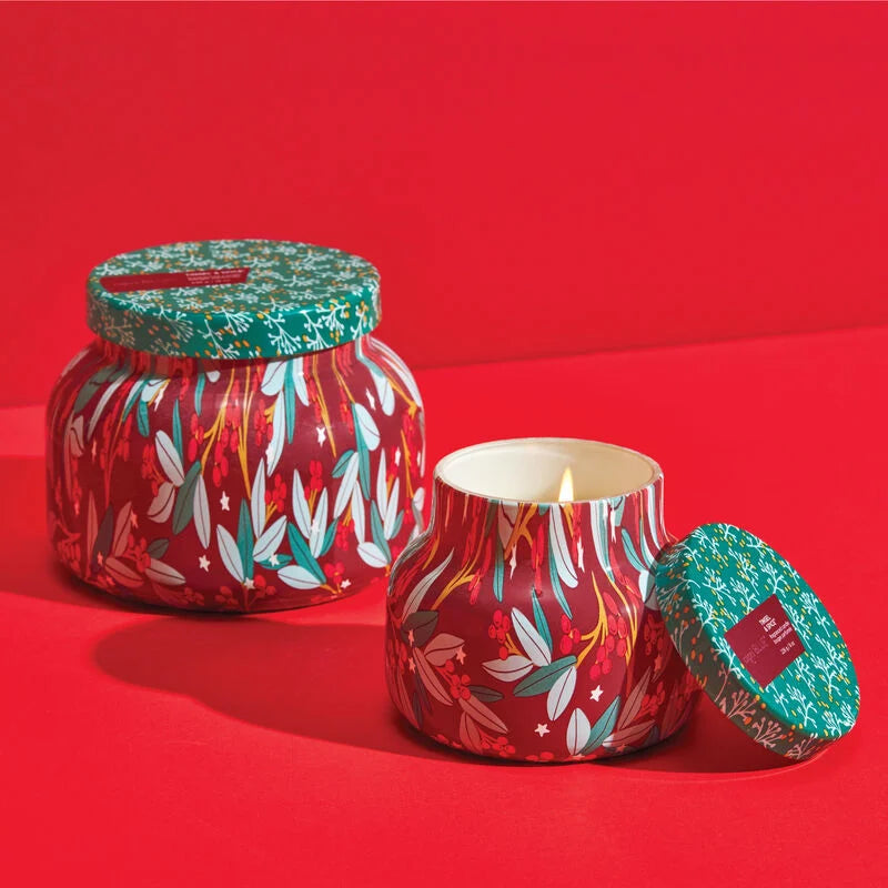 Two sizes of Tinsel and spice candles in pattern play jars, The smaller one is lit.