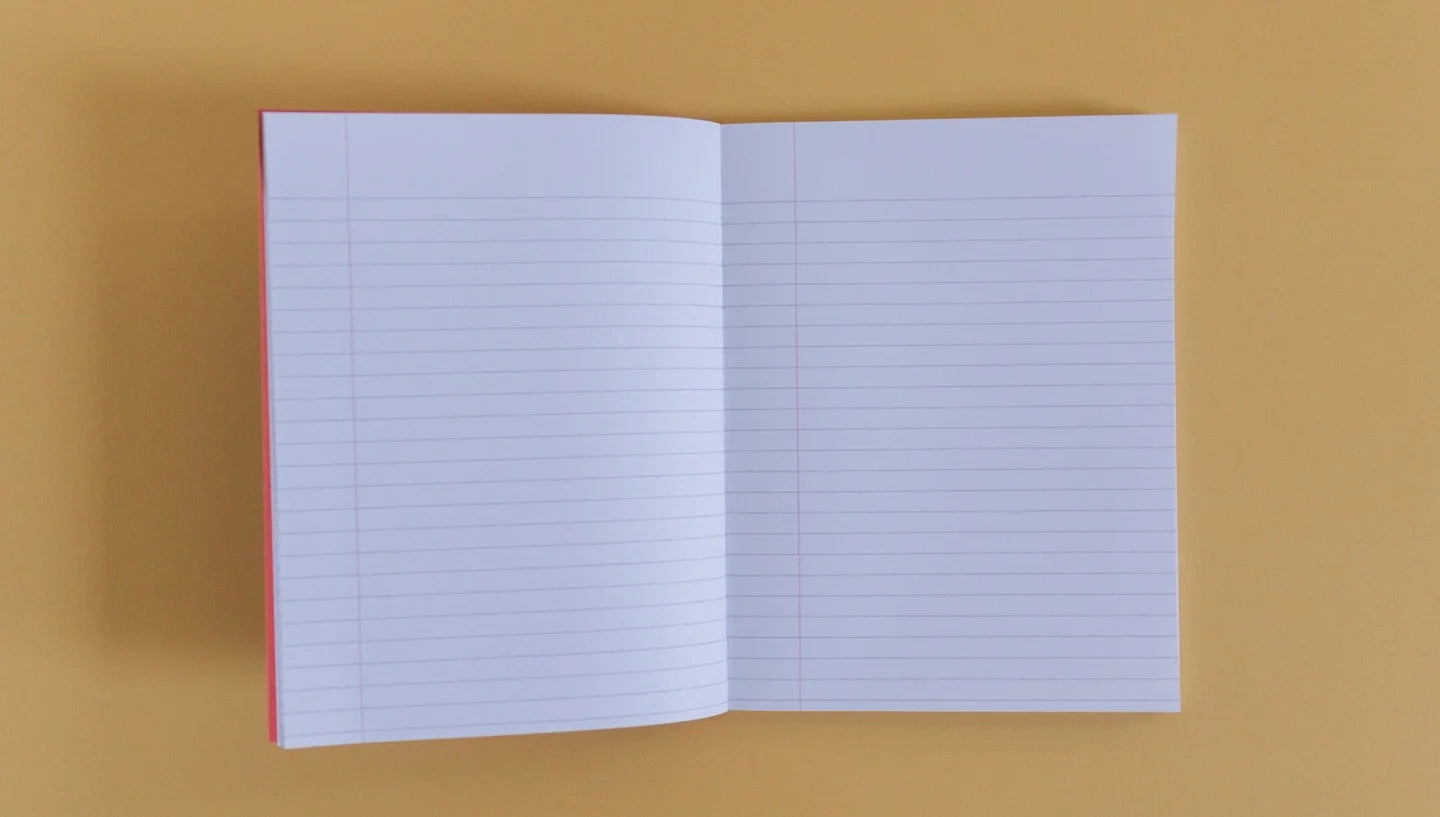 notebook opened to show the lined pages