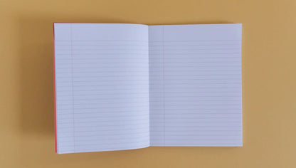 notebook opened to show the lined pages
