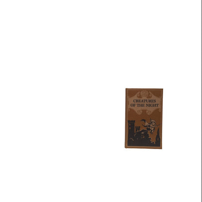 A book box titled 'Creatures of the Night' with a brown cover and black illustration, shown against a plain white background.