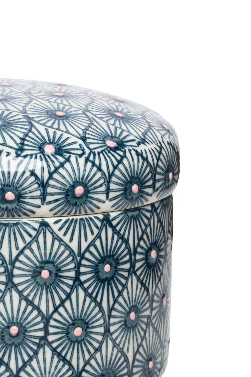 close-up of blue art deco canister