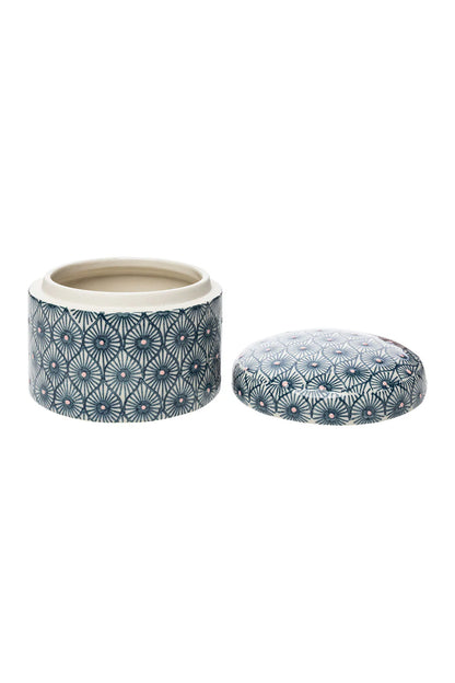 Decorative ceramic jar with lid featuring a blue pattern on a white background