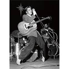 front of card is a black and white photo of elvis singing on a stage