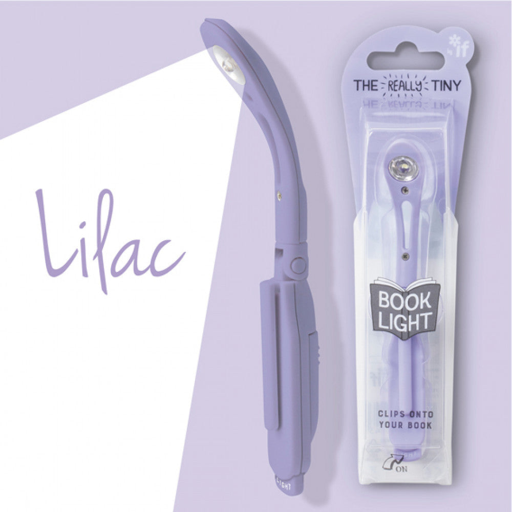 Lilac book light with packaging on a light purple background
