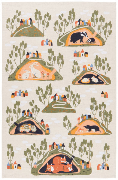 burrow dishtowel with animals in the burrows and trees above them